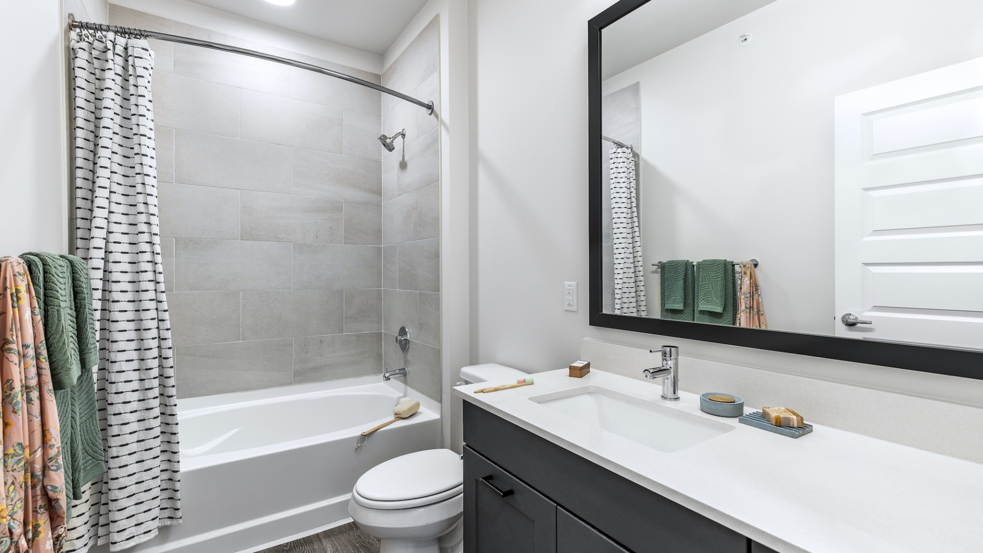 Bathroom with large vanity and soaking tub